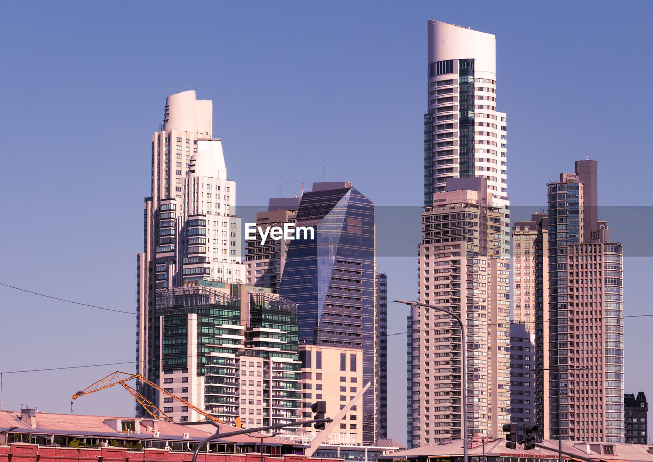 Panoramic view of the skyscrapers of the financial district. blue sky as background.