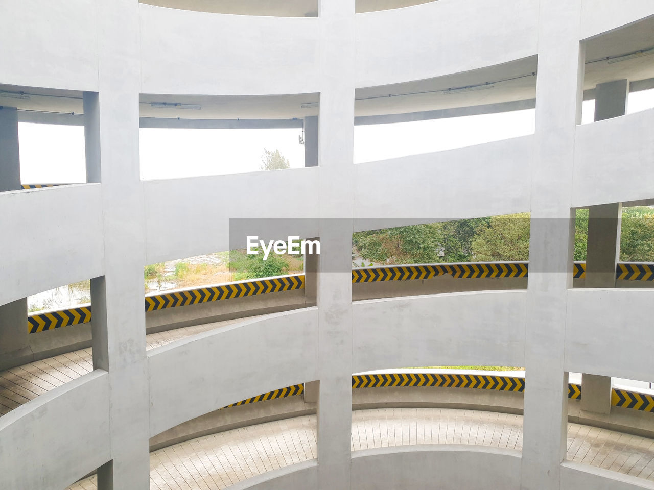 LOW ANGLE VIEW OF GLASS BUILDING