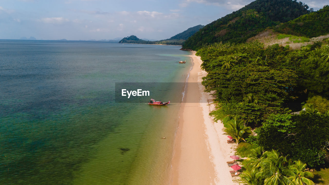 high angle view of people on beach against sky