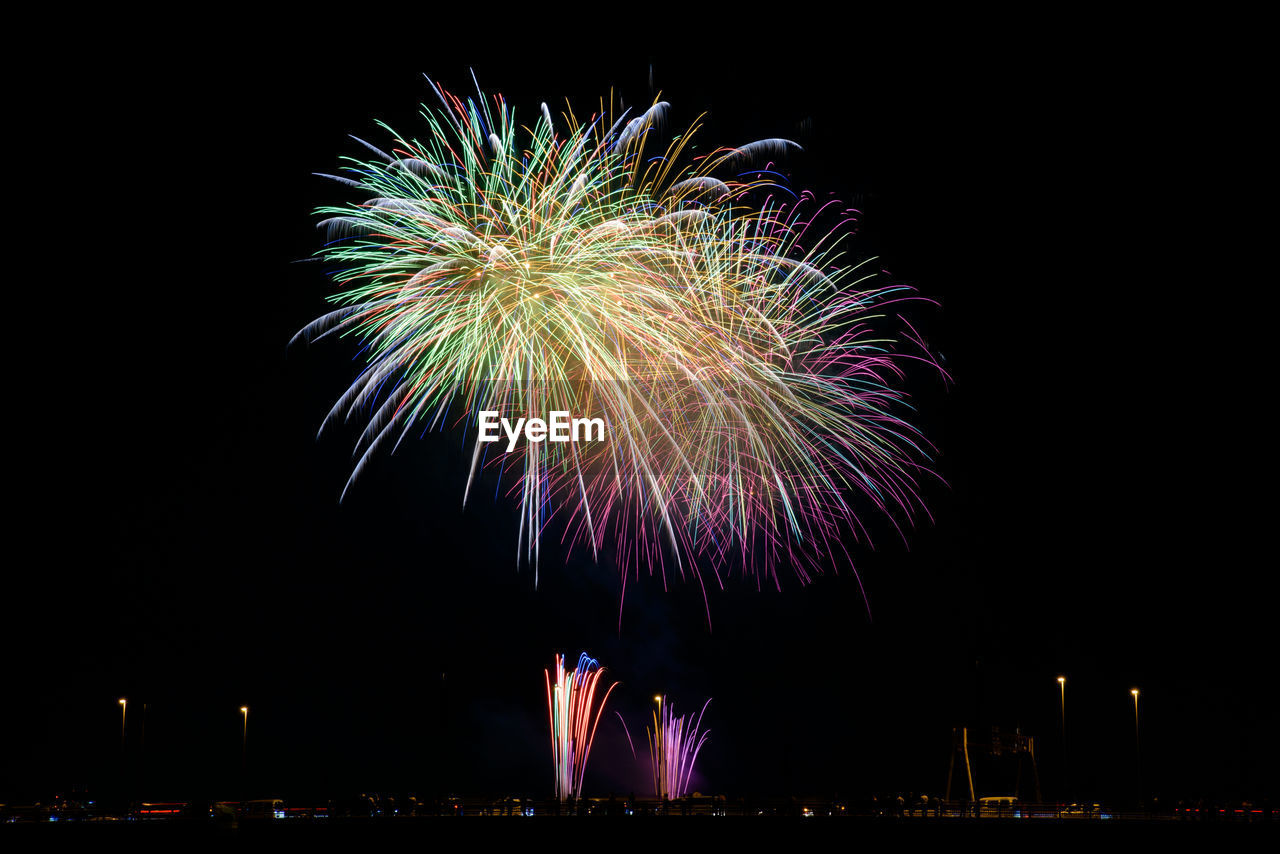 Colorful firework display in sky at night