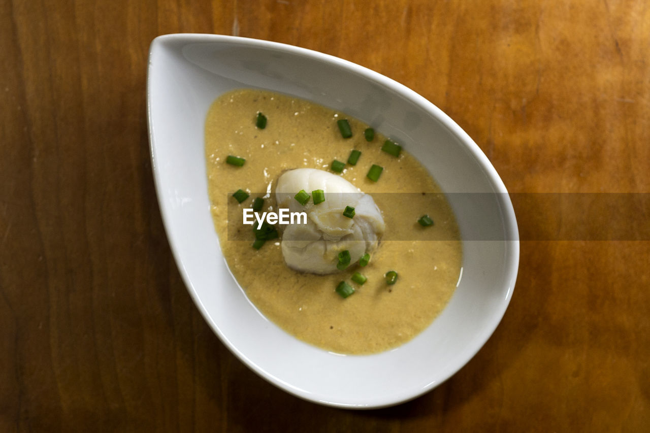 High angle view of soup served on table