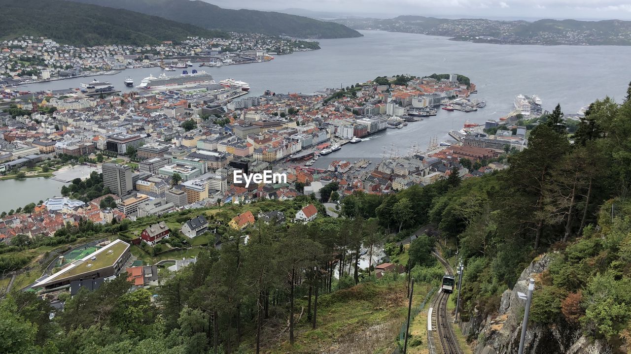 High angle view of townscape by sea