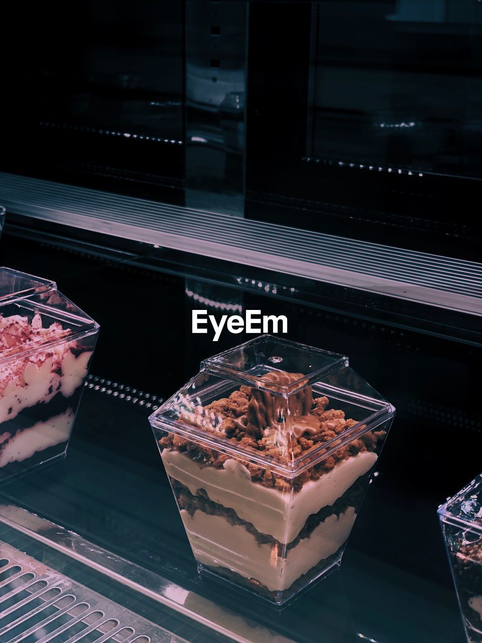 HIGH ANGLE VIEW OF ICE CREAM ON TABLE