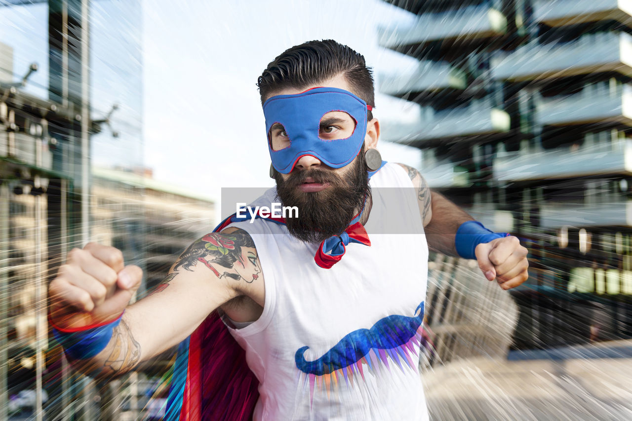 Young hipster superhero fights evil