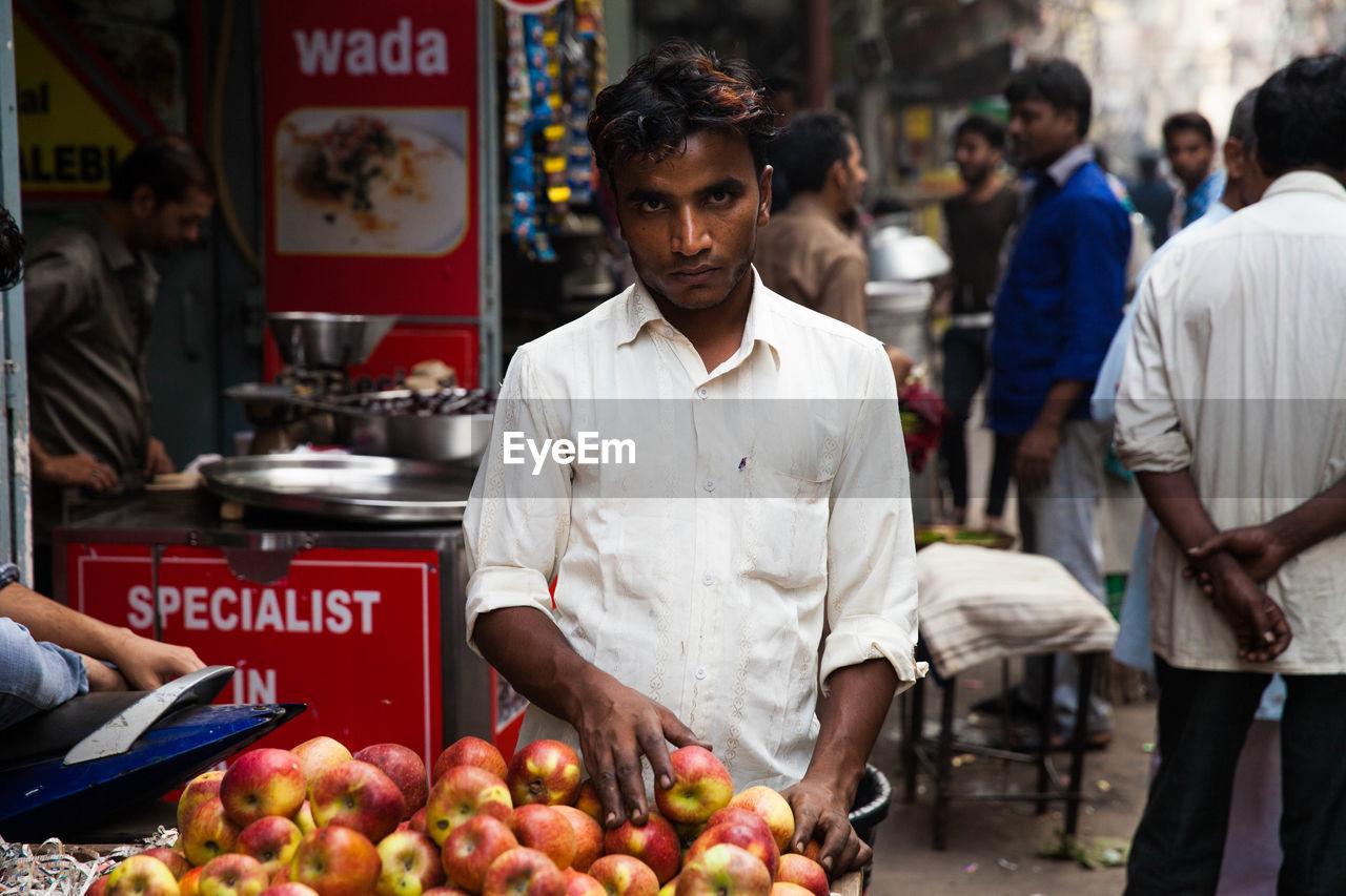 GROUP OF PEOPLE IN MARKET