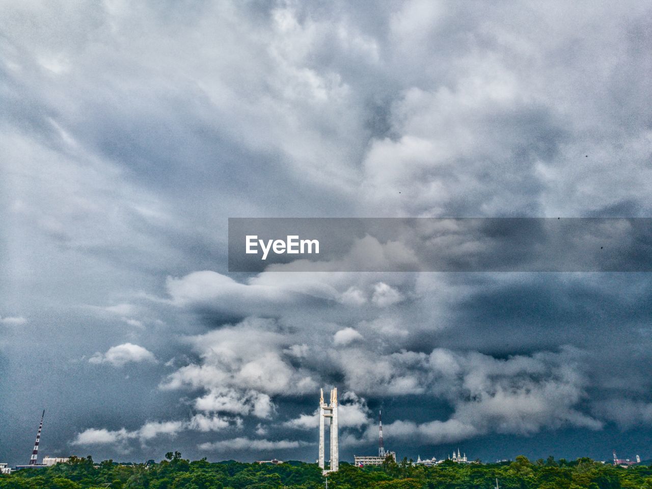 SMOKE STACK AGAINST SKY