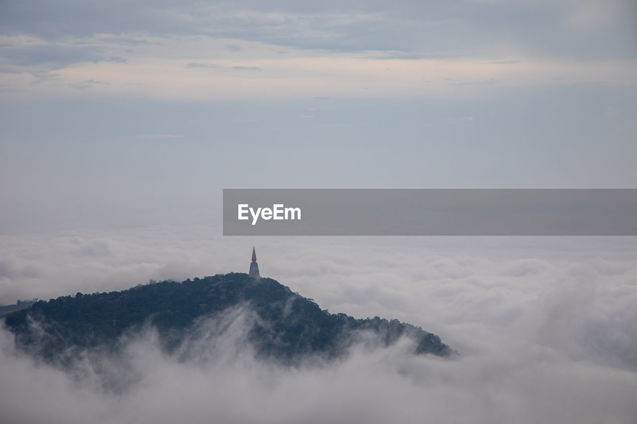 View of city against cloudy sky