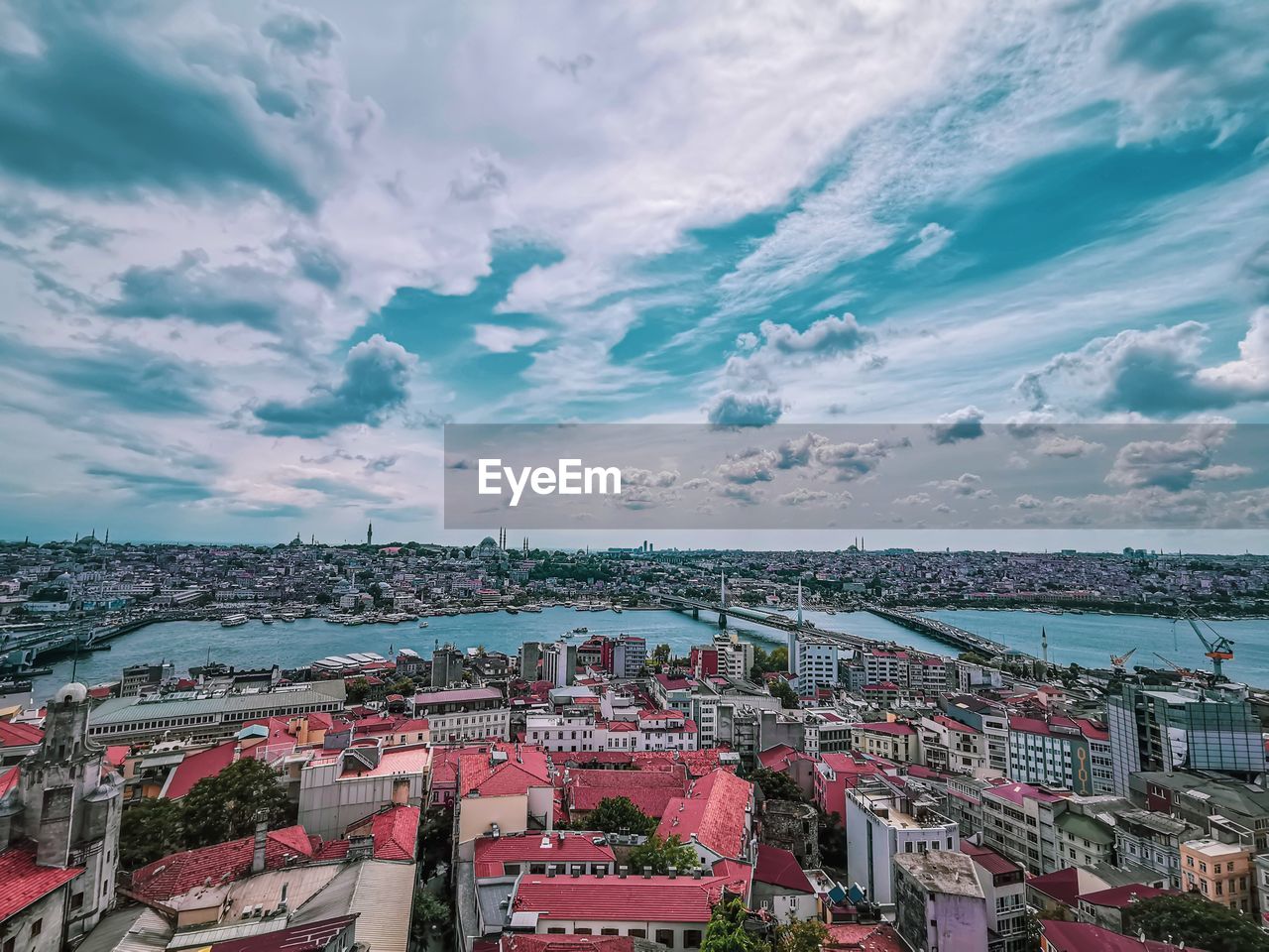 High angle view from galata tower of townscape istanbul by sea against sky 