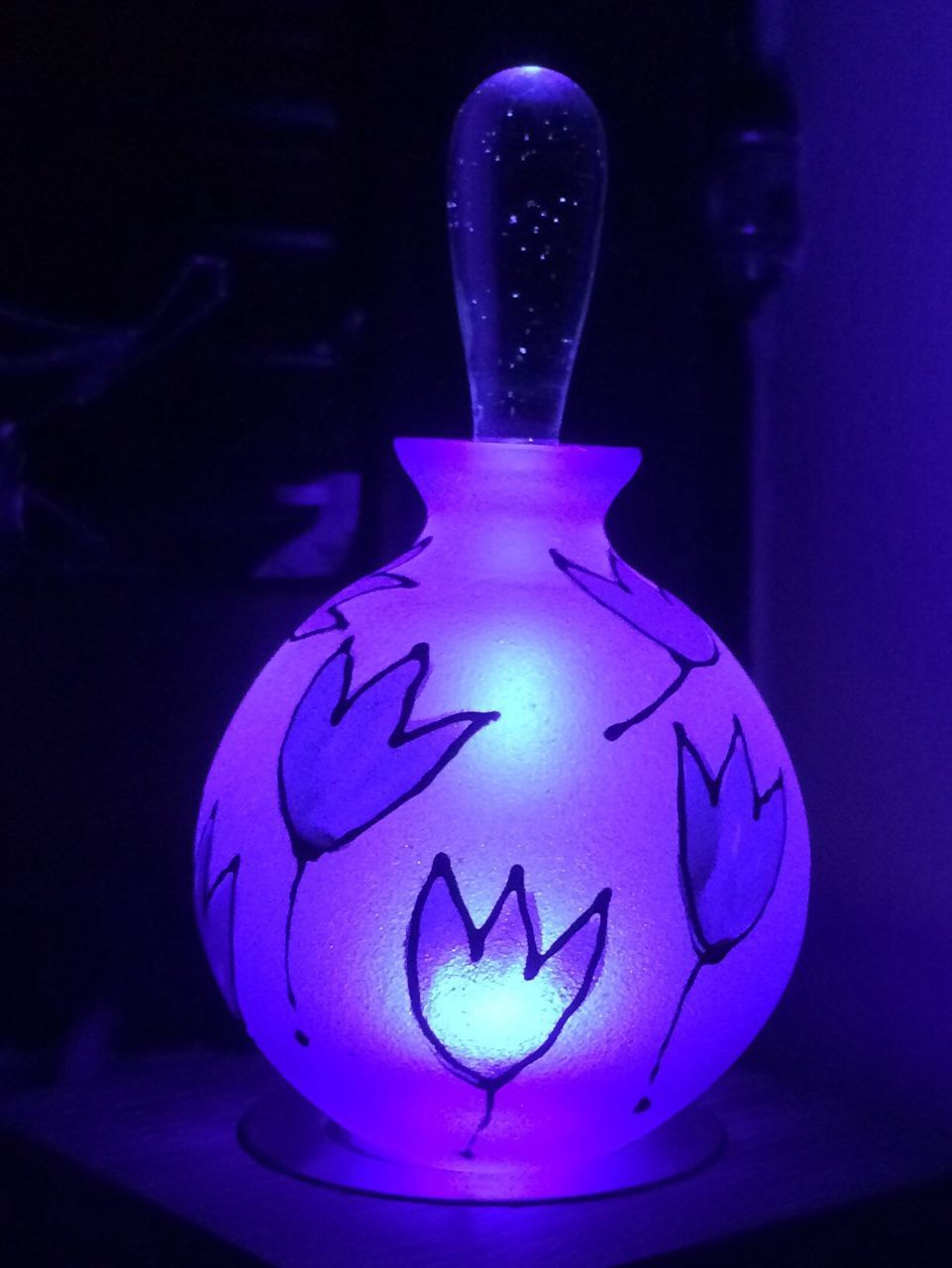 Close-up of illuminated pot against blurred background