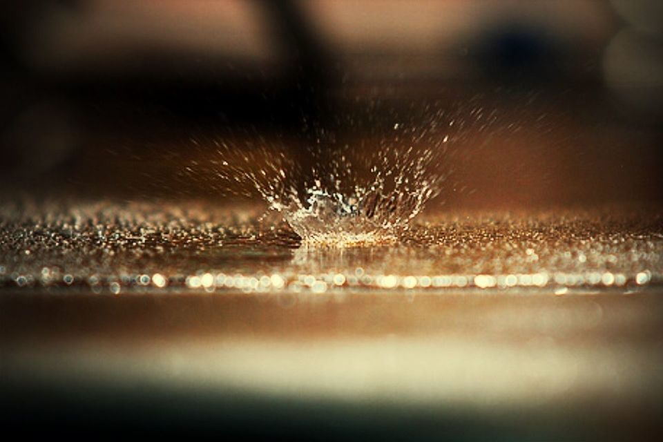 CLOSE-UP OF WATER SPLASHING