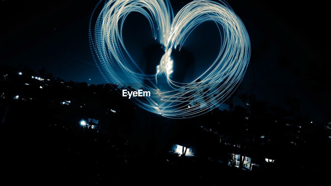 LIGHT TRAILS ON STAGE AT NIGHT