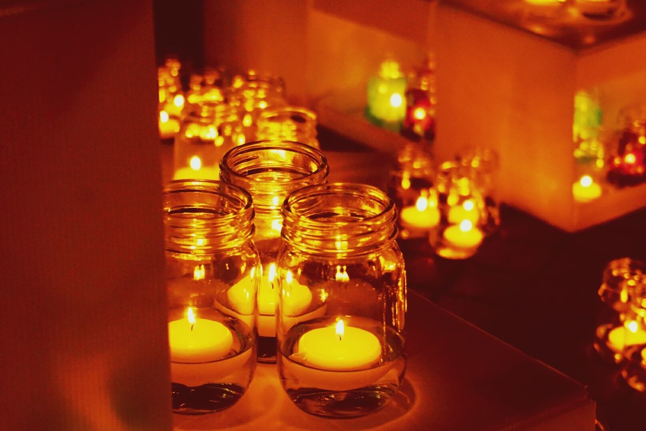 Close-up of illuminated tea lights