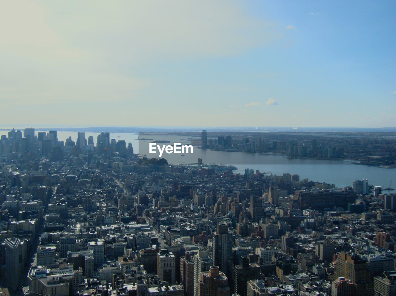 High angle view of buildings in city against sky