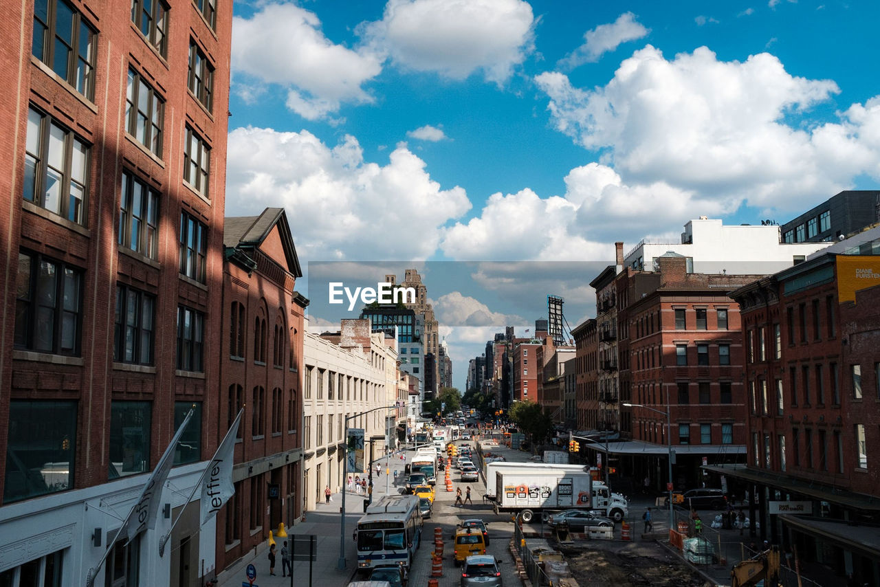 Buildings in city against sky