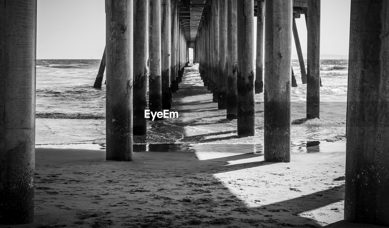 View of wooden pier on beach