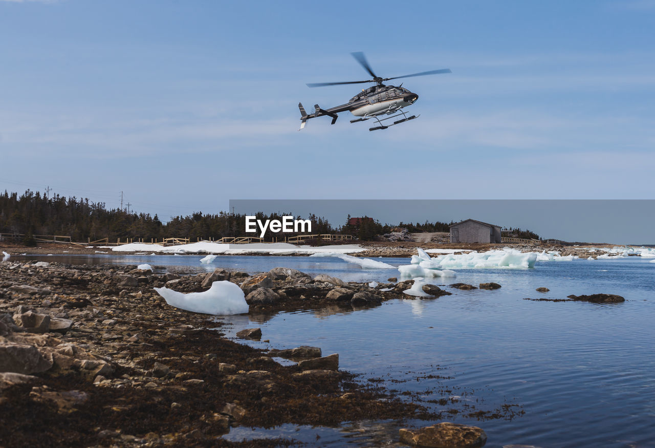 Helicopter flying over pack ice im