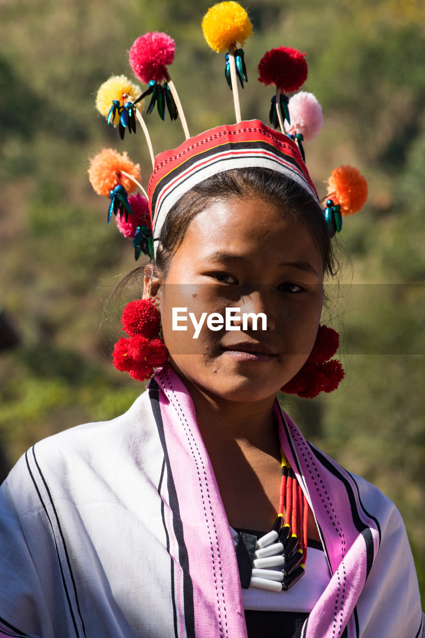 CLOSE-UP PORTRAIT OF GIRL WITH OUTDOORS