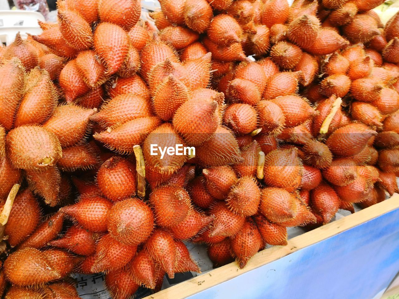 CLOSE-UP OF FRUITS FOR SALE IN MARKET STALL