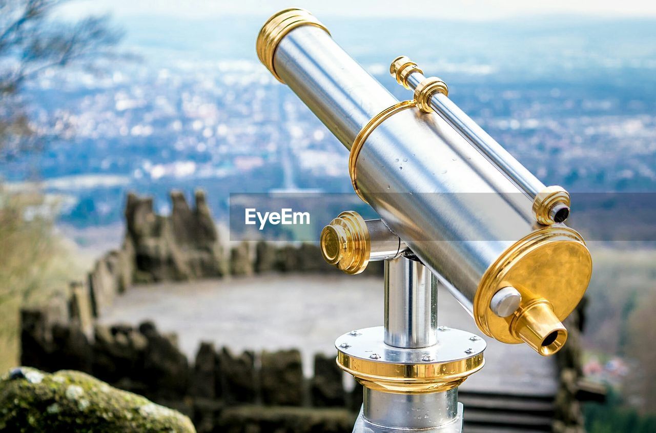 Coin-operated binocular against landscape