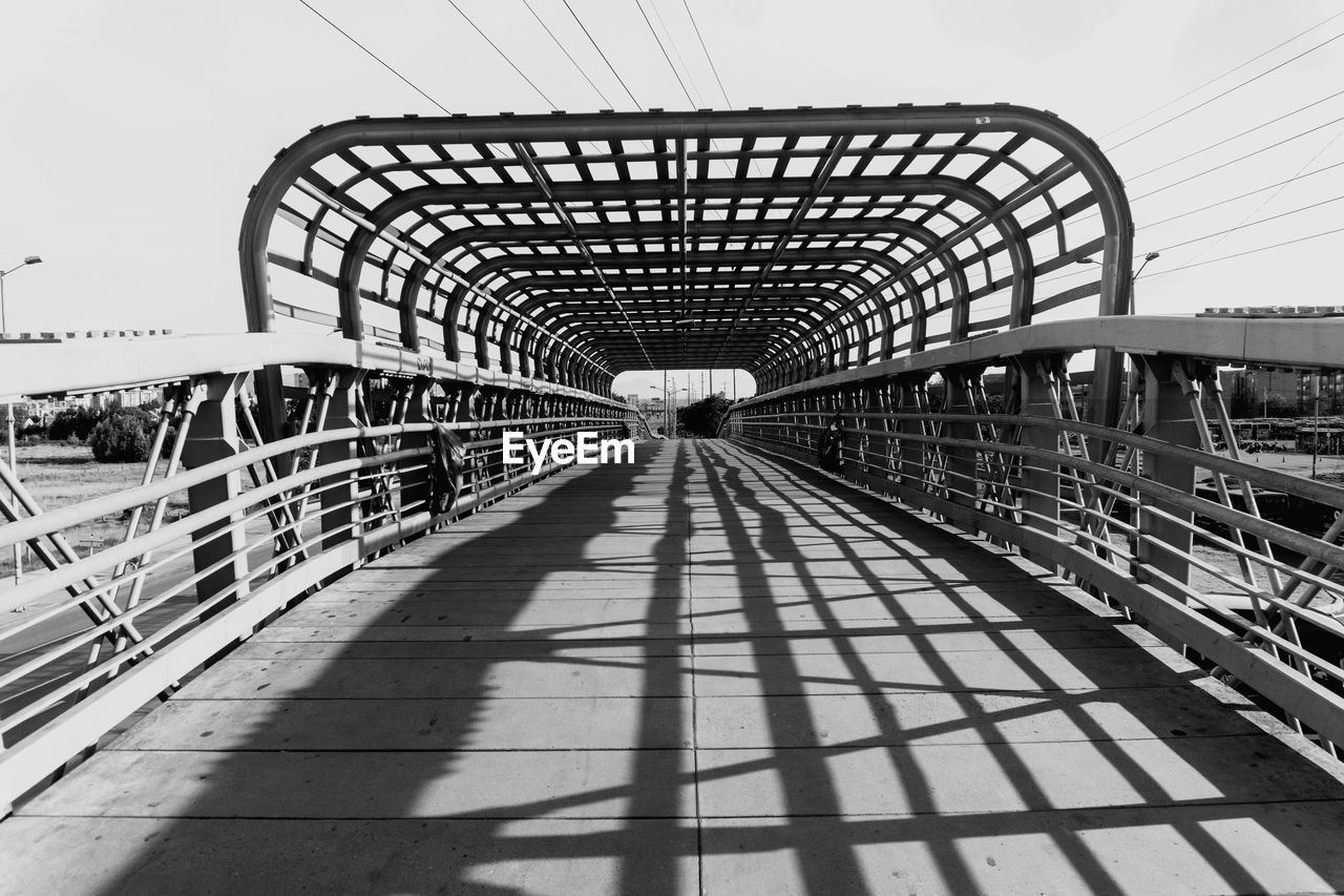 VIEW OF FOOTBRIDGE IN SUNLIGHT