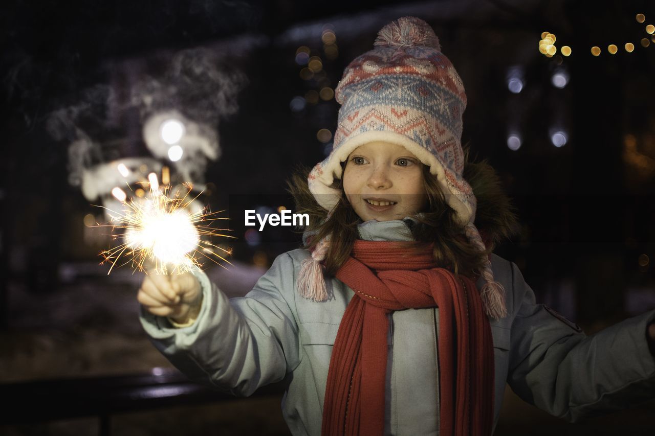 Girl with sparkler.