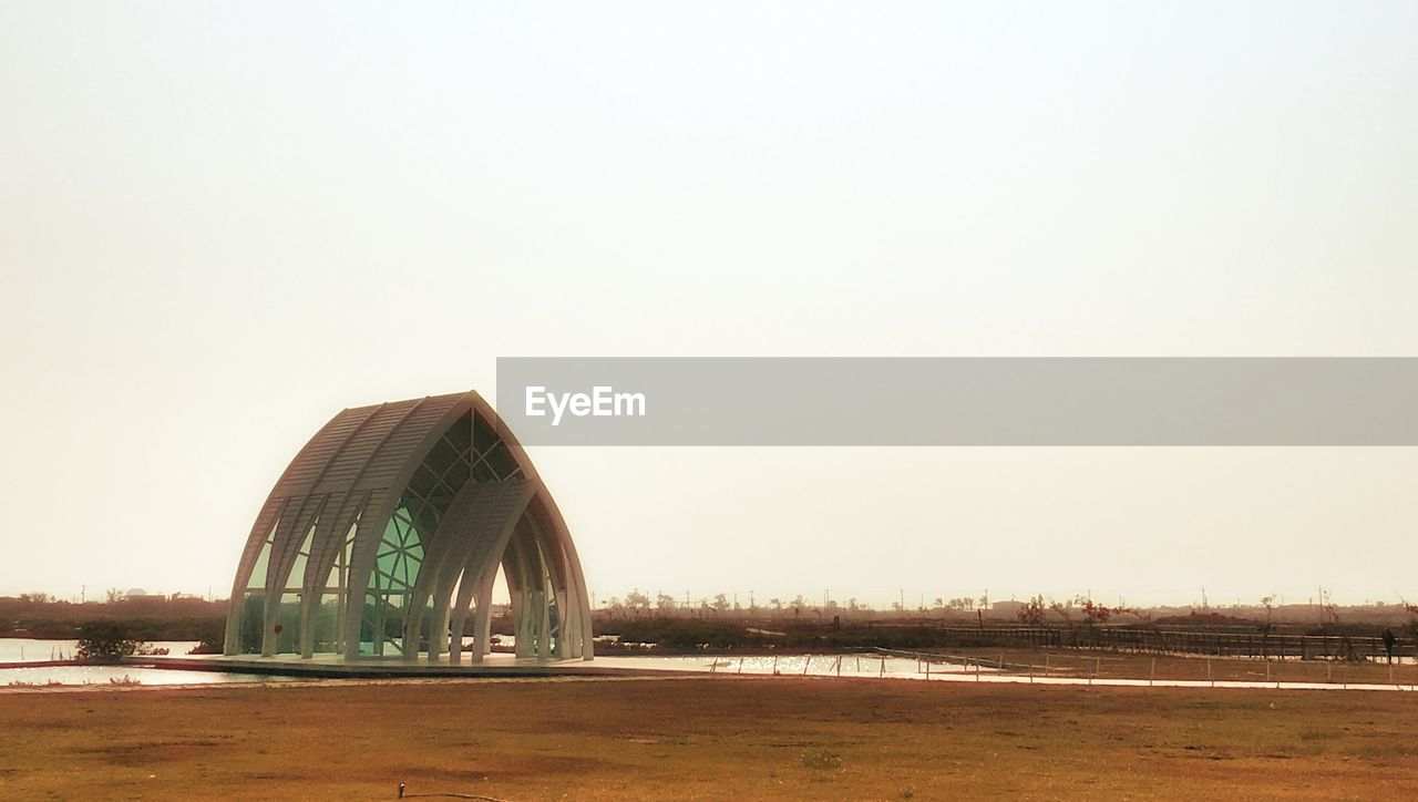 VIEW OF BUILDING AGAINST CLEAR SKY