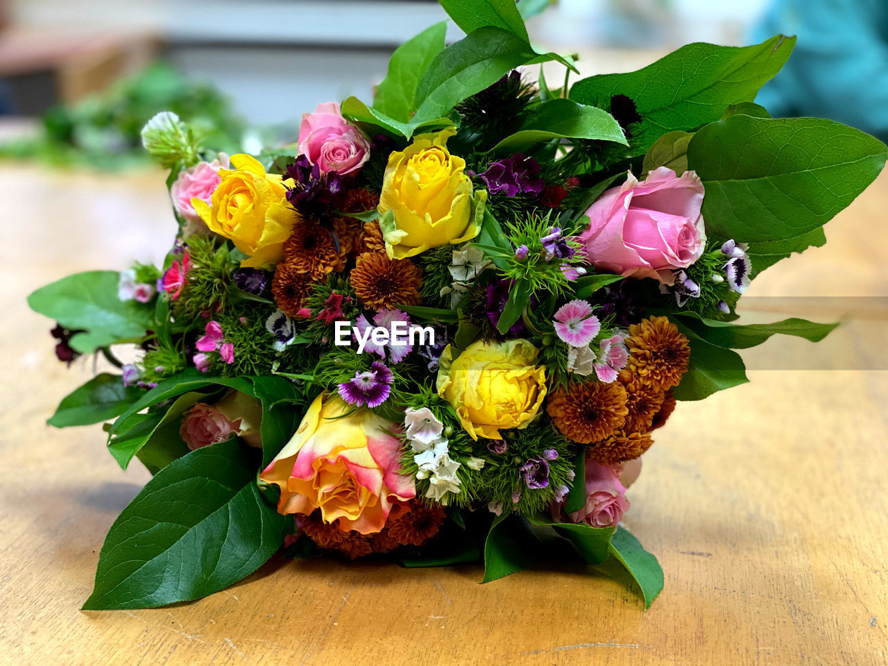 Close-up of multi colored flower pot on table