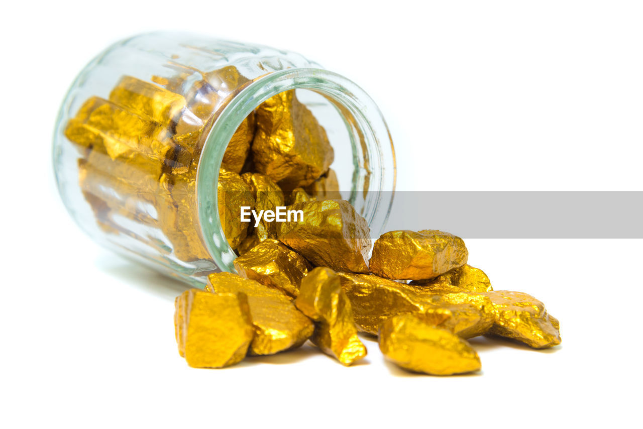 Gold nugget in glass jar