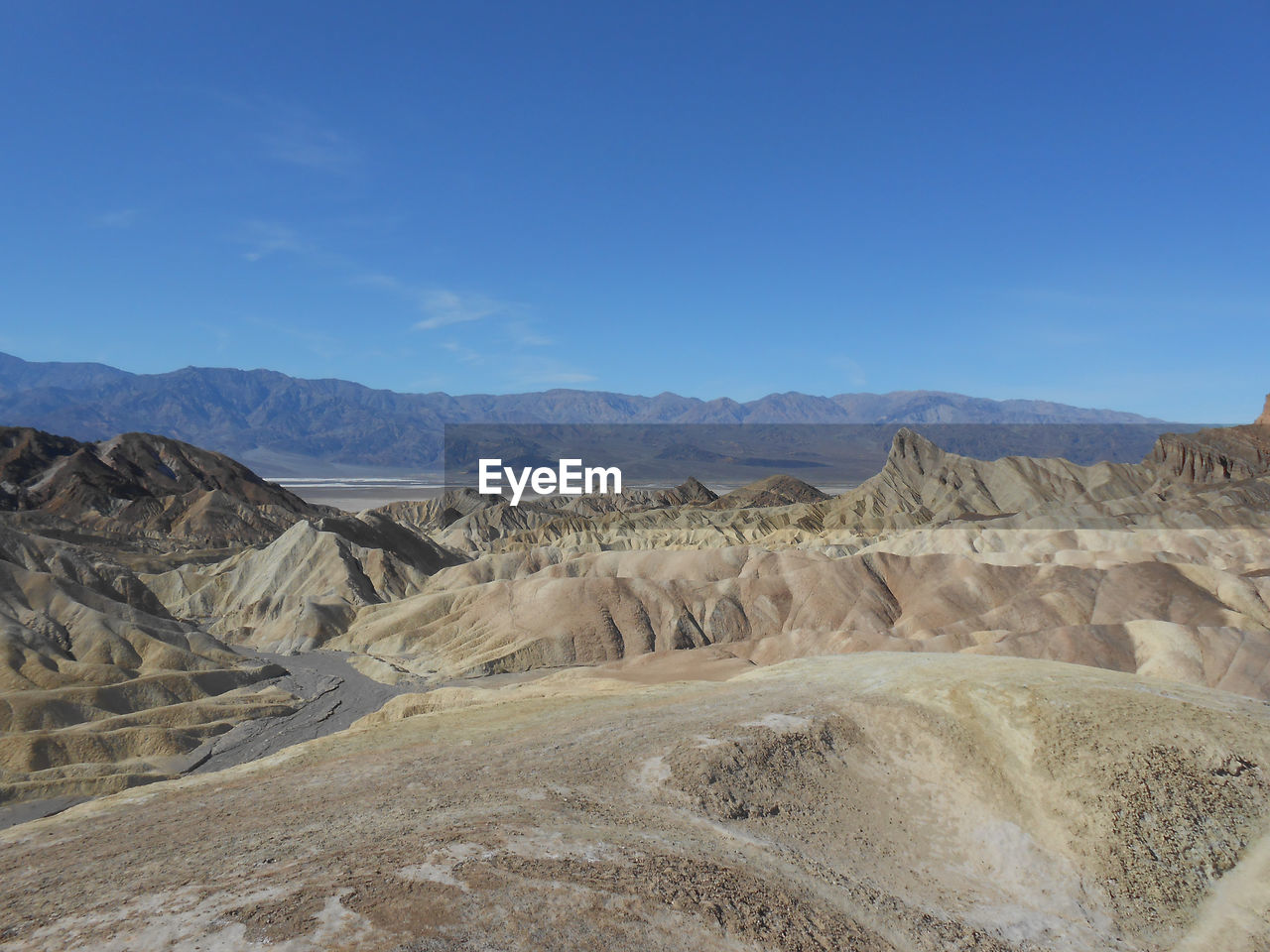 scenic view of rocky mountains against sky