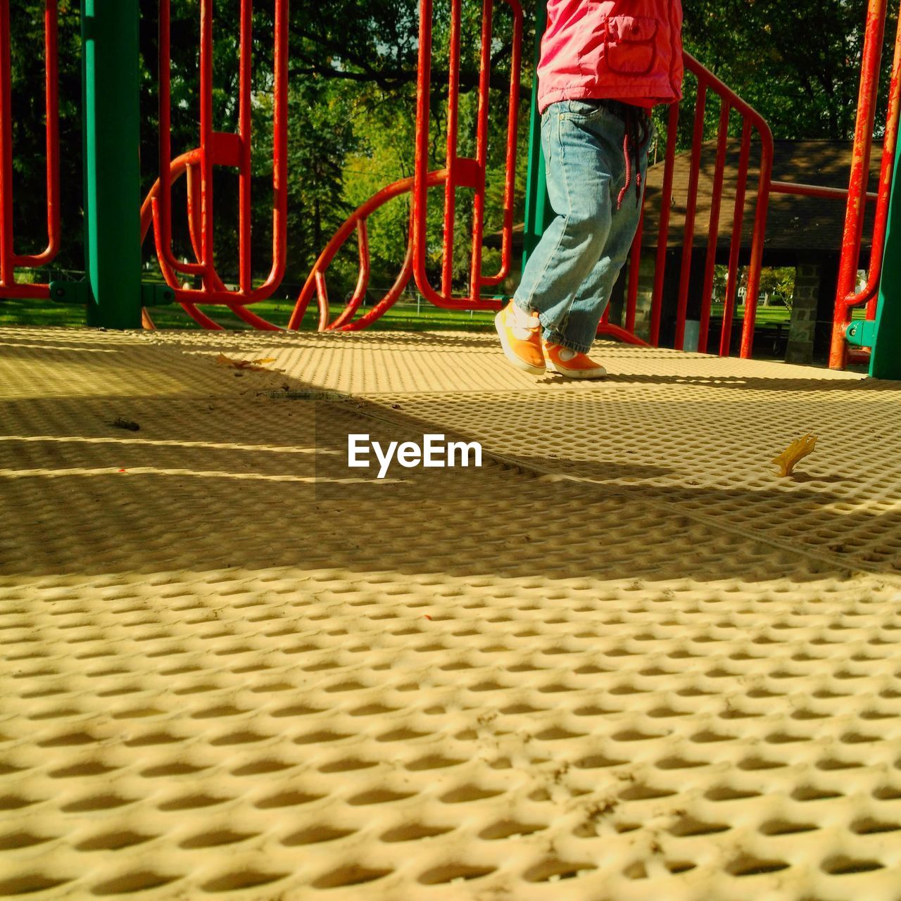 LOW SECTION OF MAN ON SKATEBOARD