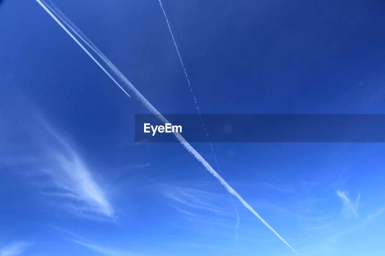 Low angle view of vapor trail in sky