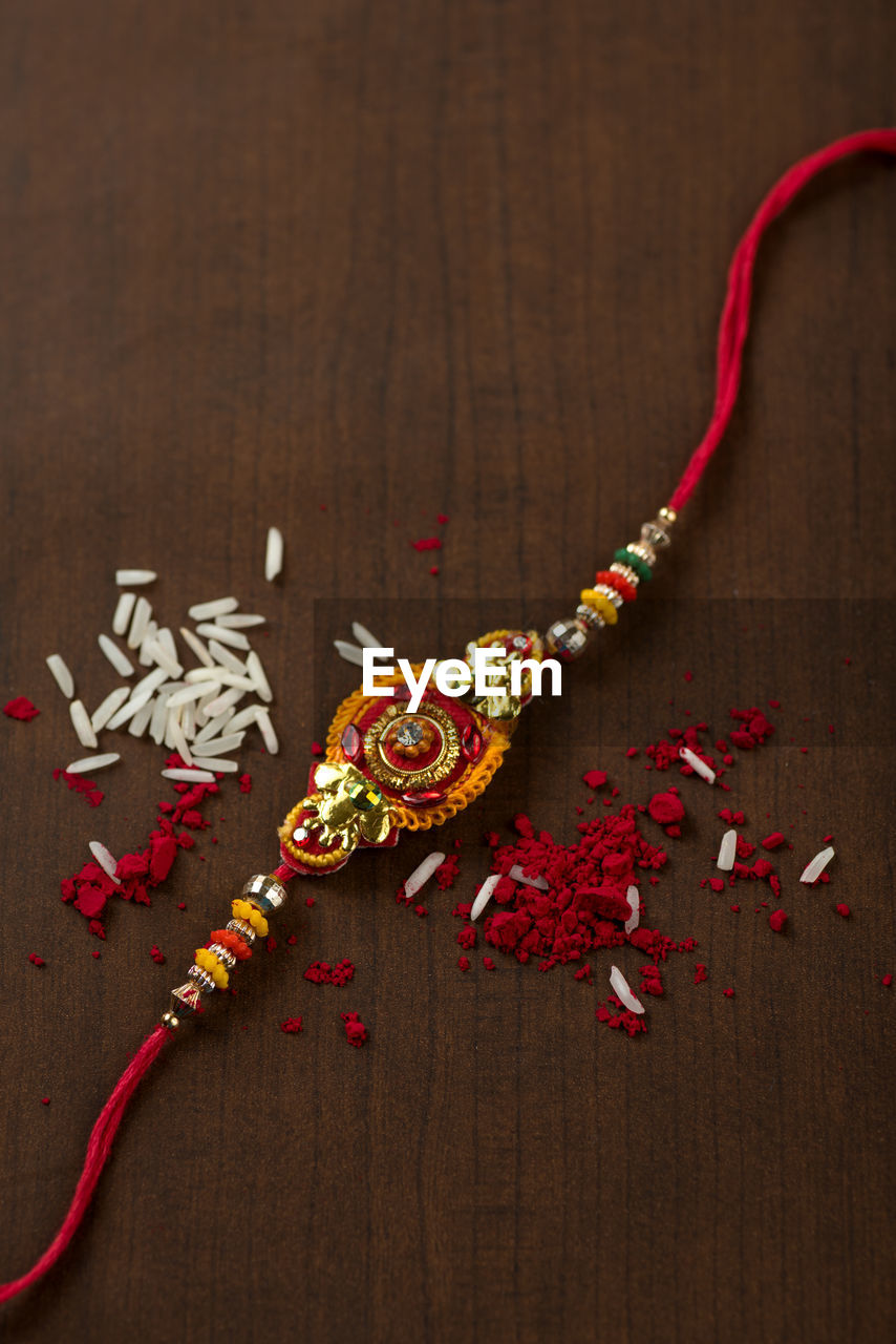 High angle view of red berries on table