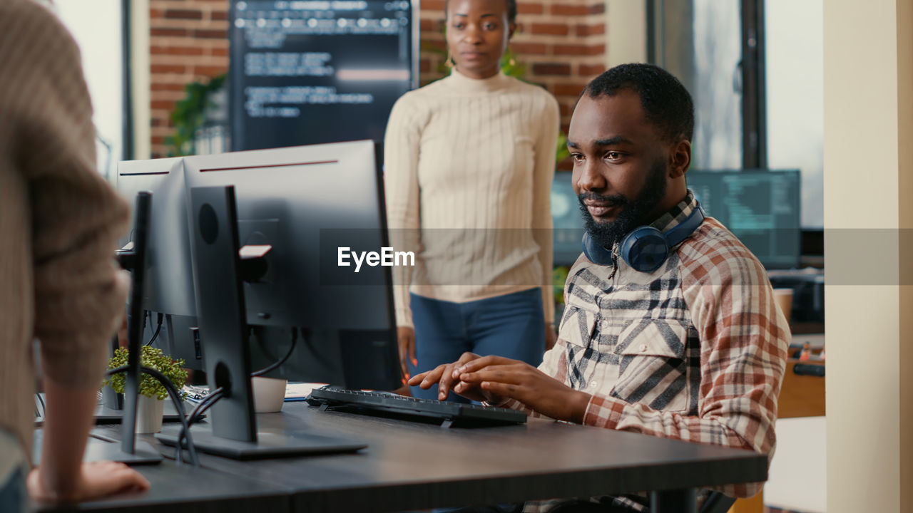 Computer programmer working at office