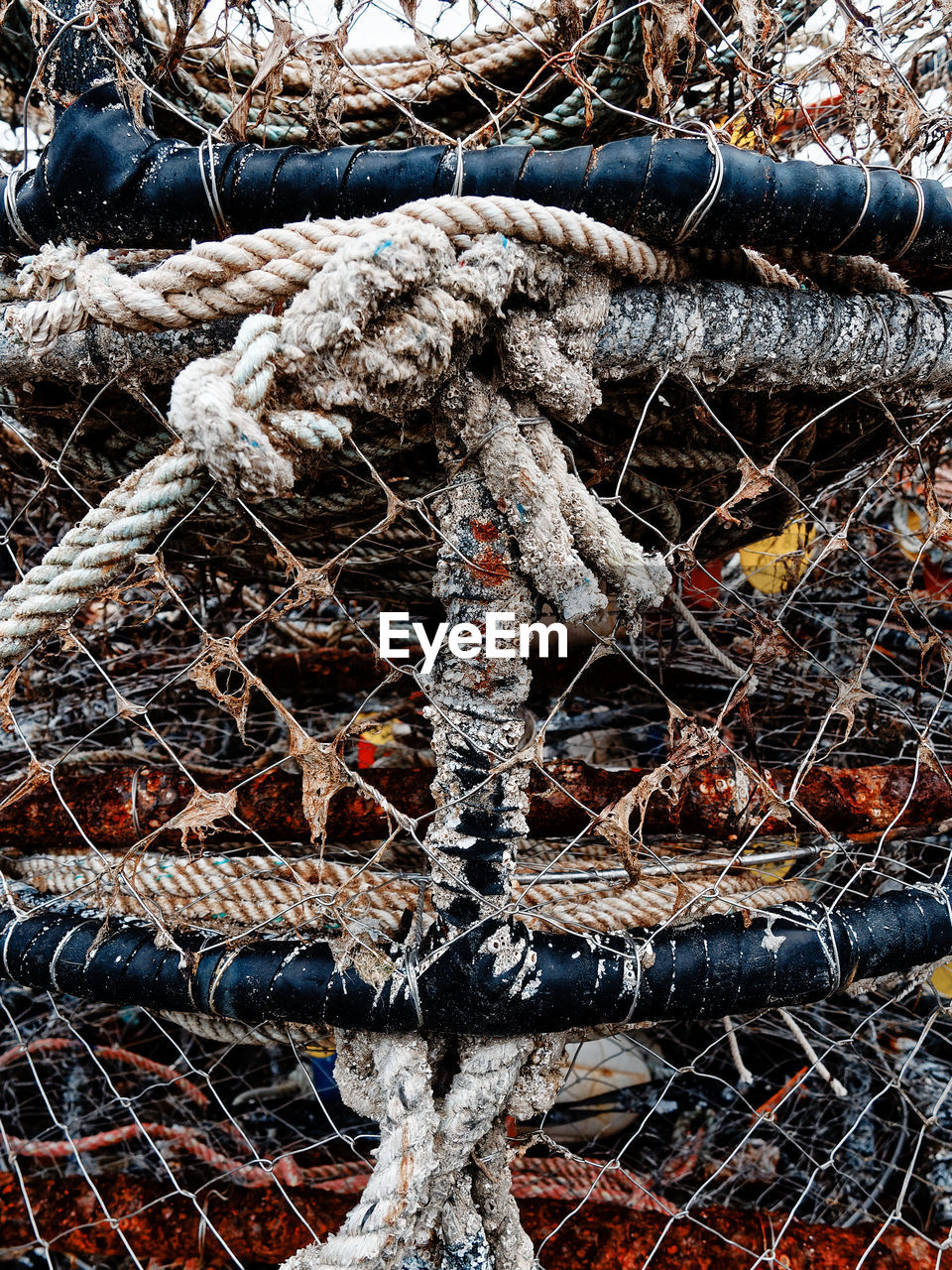 CLOSE-UP OF ROPE FISHING NET