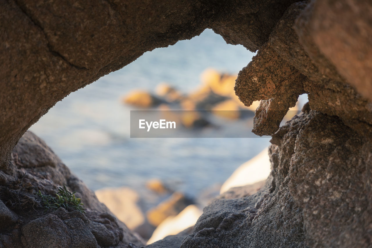 Rock in the shape of a snake's head, baia trinità beach, la maddalena, sardinia, italy