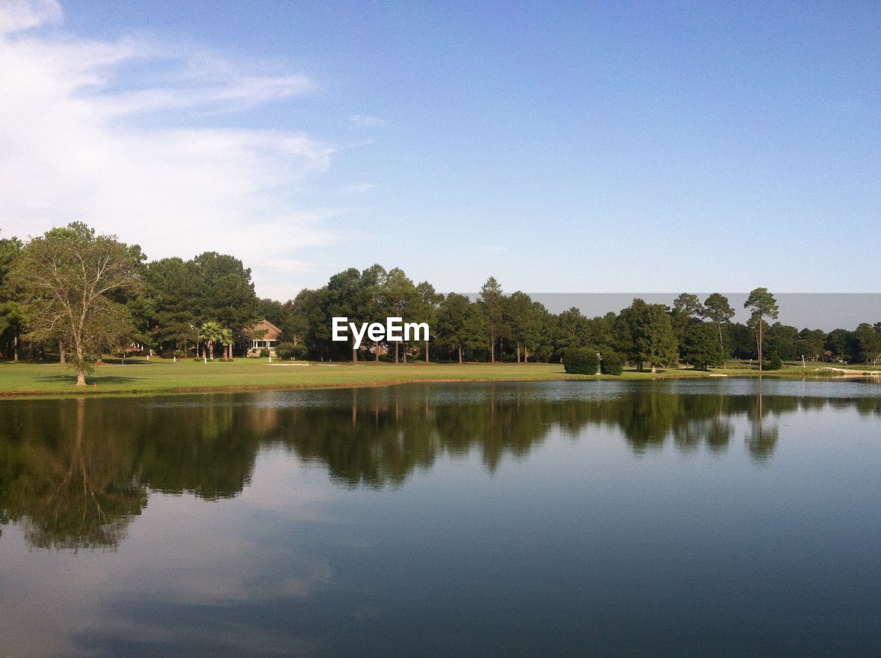 SCENIC VIEW OF CALM LAKE