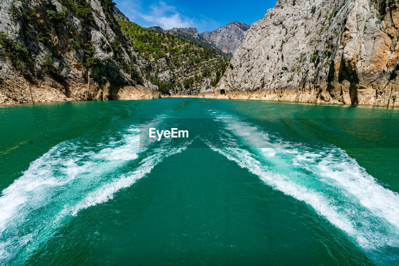 high angle view of sea against mountain