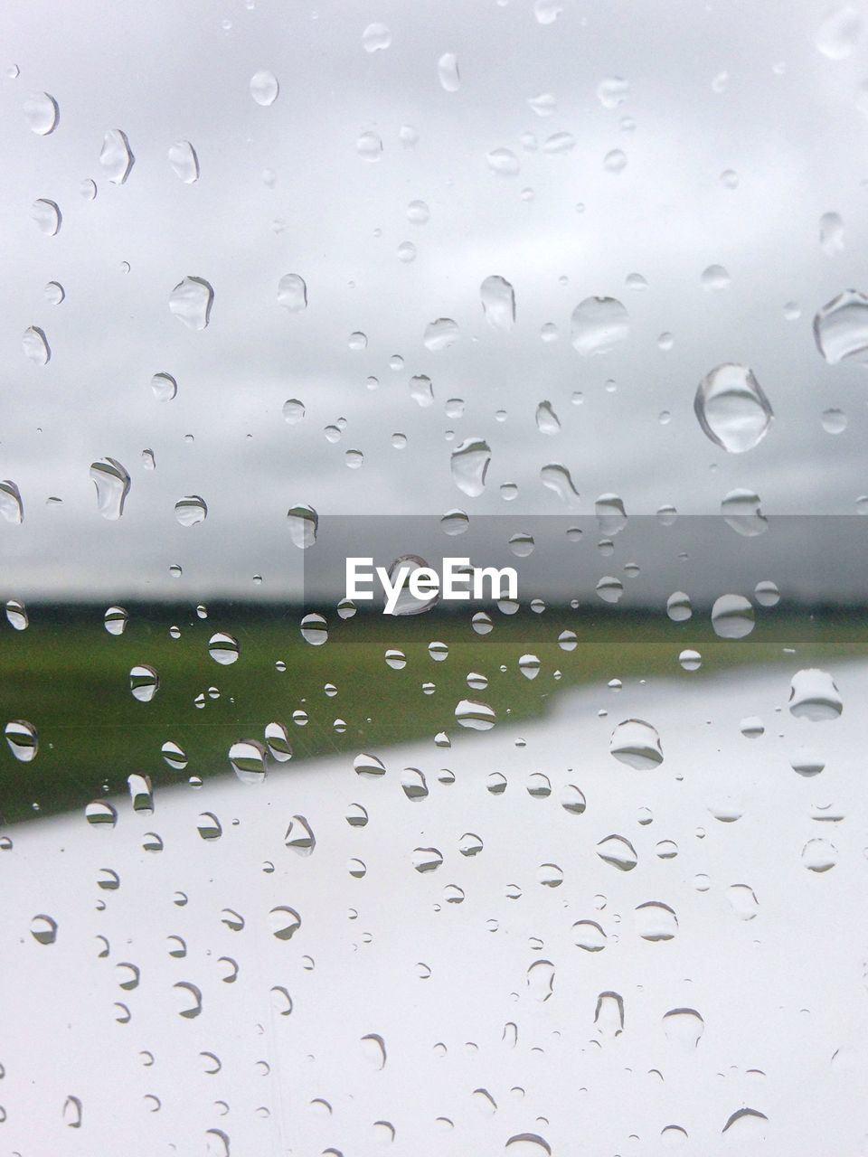 Close-up of water drops on glass