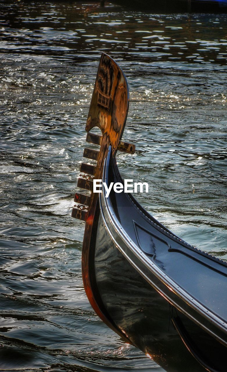 Close-up of boat moored in sea