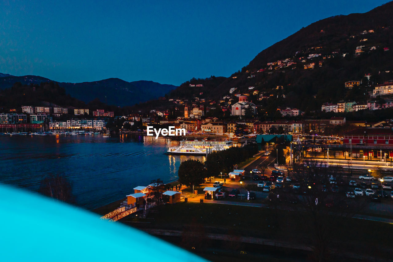 Aerial view of laveno on lake maggiore at night, blue hour