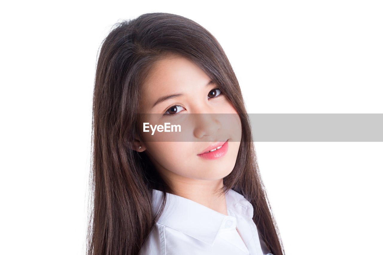 CLOSE-UP PORTRAIT OF A TEENAGE GIRL