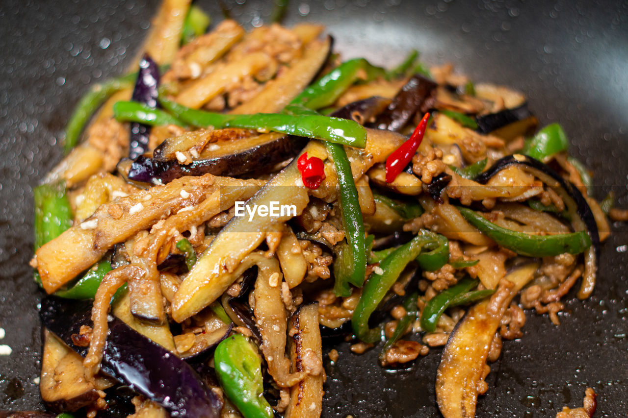 High angle view of chinese food in cooking pan