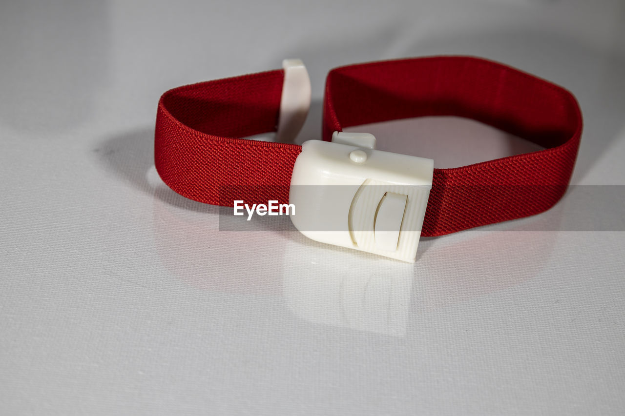 red, pink, fashion accessory, indoors, hand, love, emotion, positive emotion, celebration, white, gift, studio shot, event