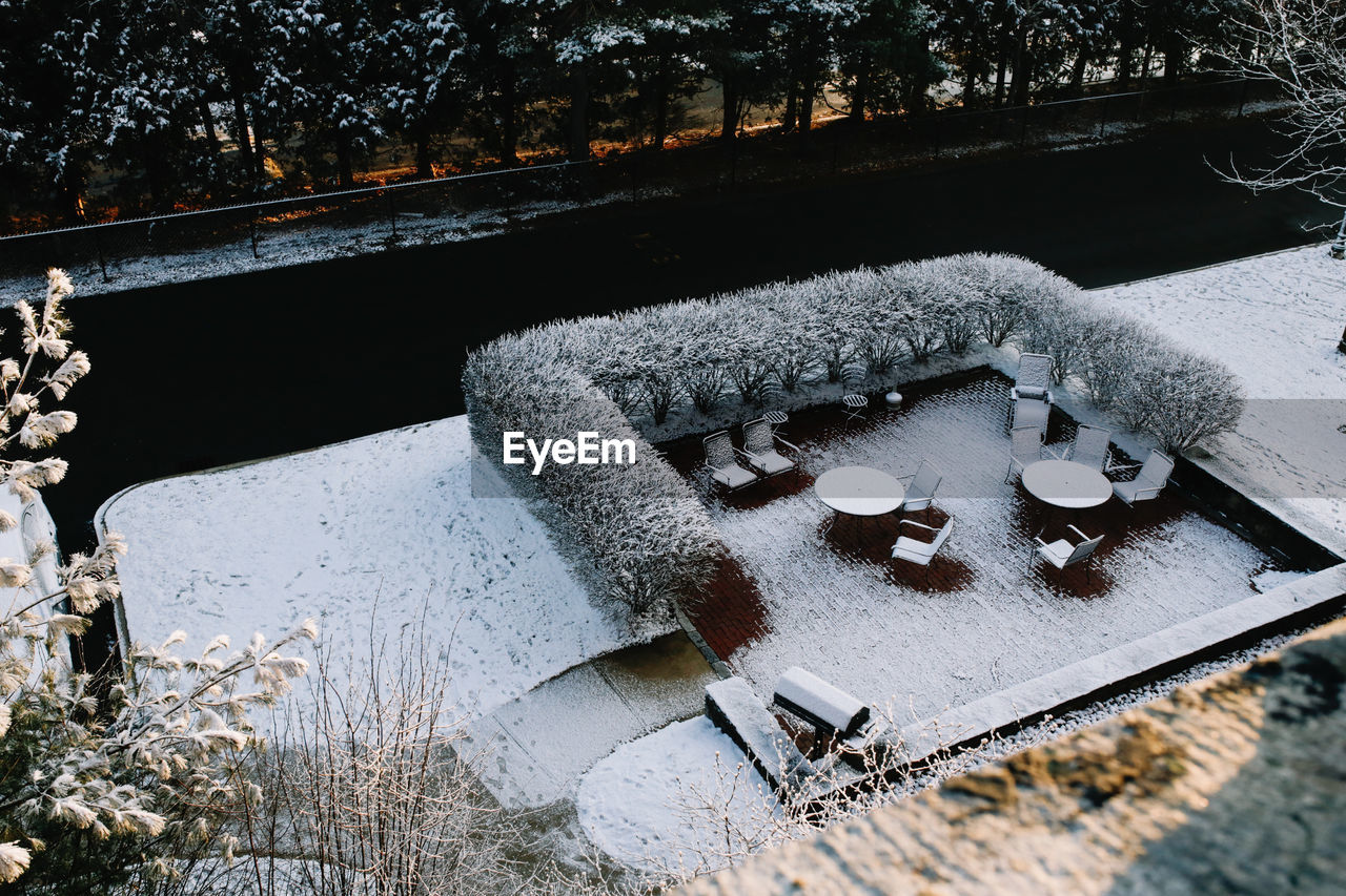 High angle view of snow on railing during winter