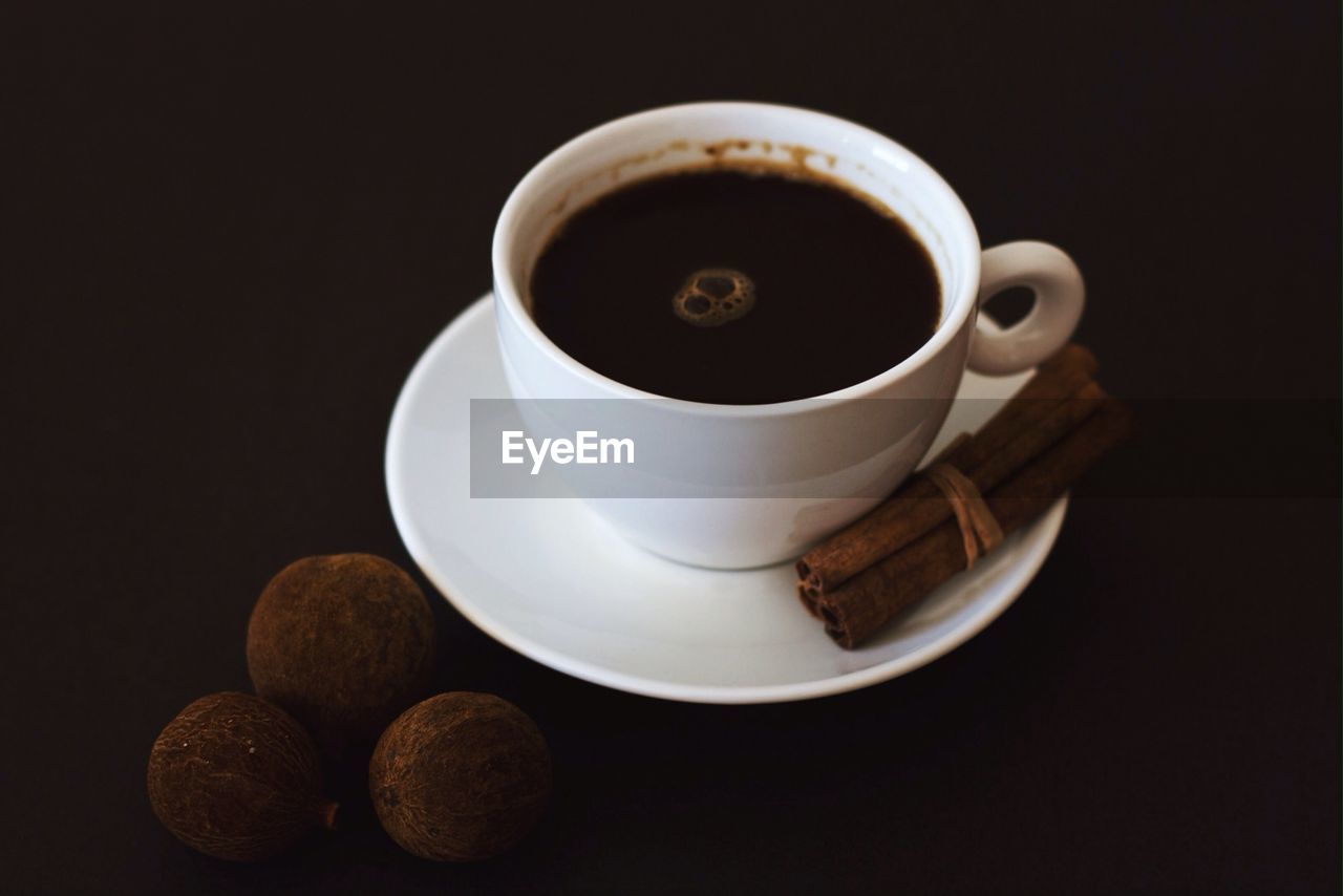 High angle view of coffee and spices on table