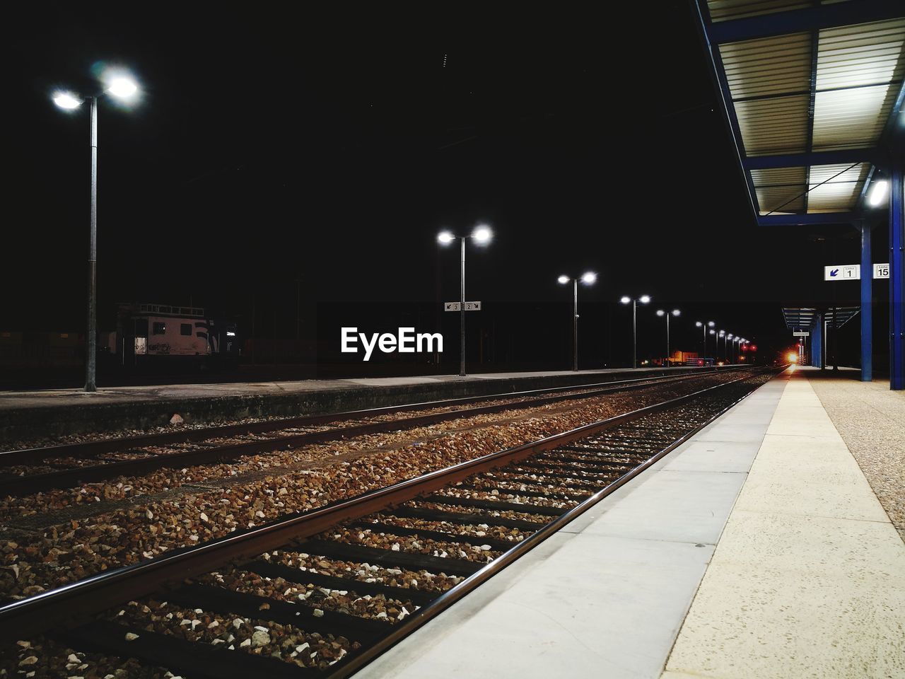 RAILROAD TRACKS AT NIGHT