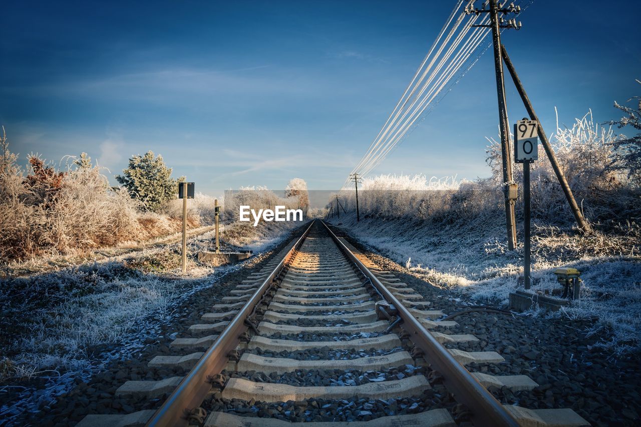 Railroad tracks against sky