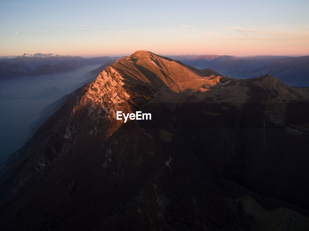 Scenic view of mountains against sky during sunset