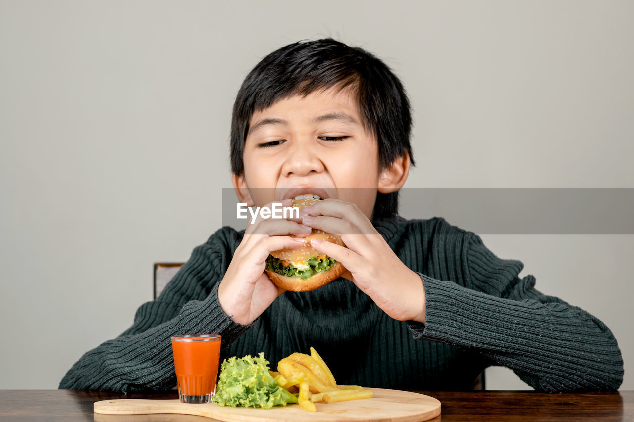 HAPPY BOY EATING FOOD