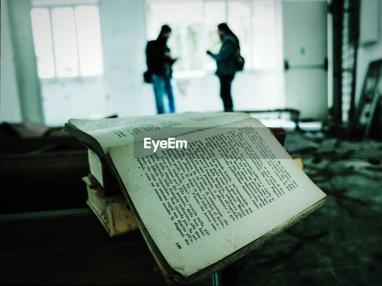 Close-up of old books in abandoned building